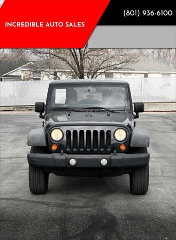 used 2011 Jeep Wrangler Unlimited car, priced at $14,995