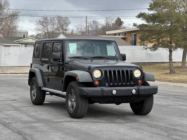 used 2011 Jeep Wrangler Unlimited car, priced at $14,995