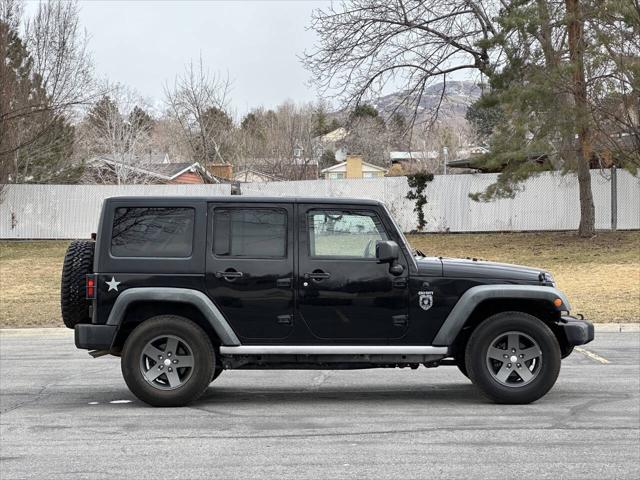 used 2011 Jeep Wrangler Unlimited car, priced at $14,995