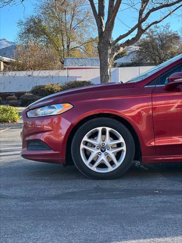 used 2016 Ford Fusion car, priced at $6,995