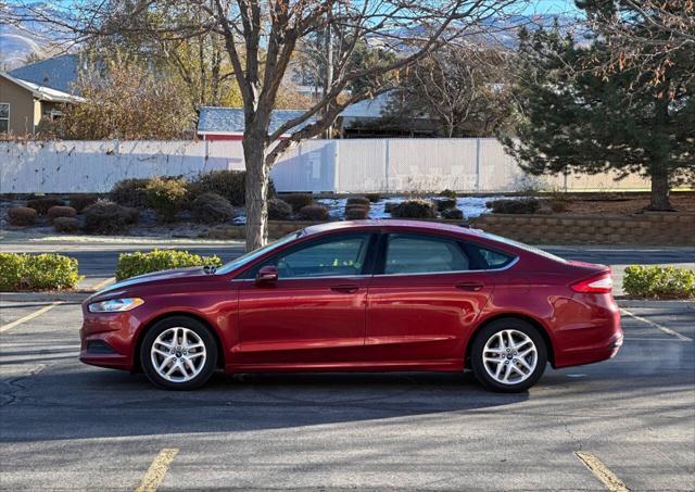 used 2016 Ford Fusion car, priced at $6,995