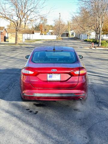 used 2016 Ford Fusion car, priced at $6,995