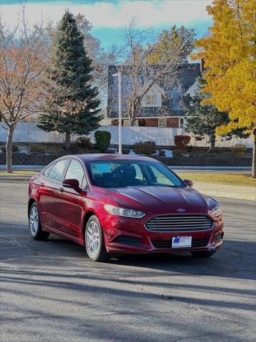 used 2016 Ford Fusion car, priced at $6,995