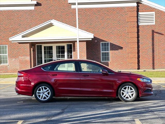 used 2016 Ford Fusion car, priced at $6,995