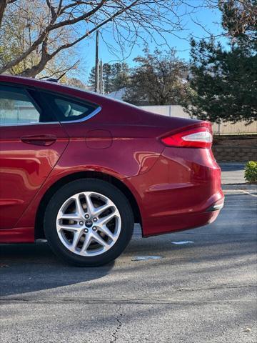 used 2016 Ford Fusion car, priced at $6,995