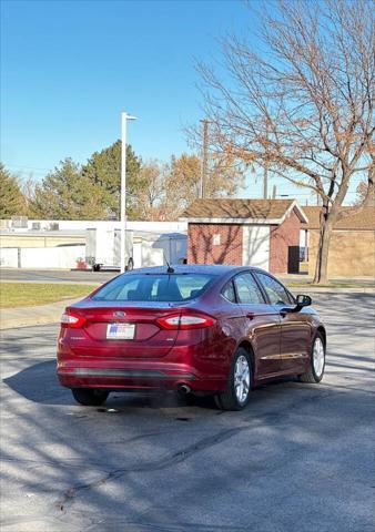 used 2016 Ford Fusion car, priced at $6,995