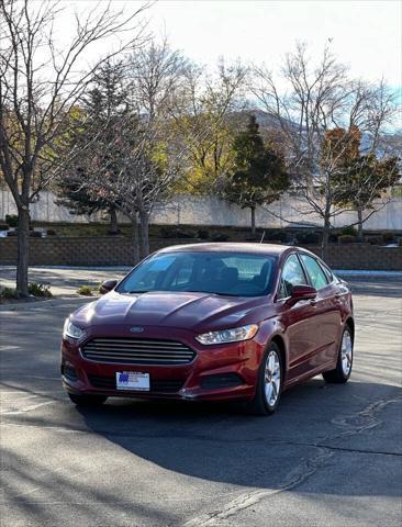 used 2016 Ford Fusion car, priced at $6,995