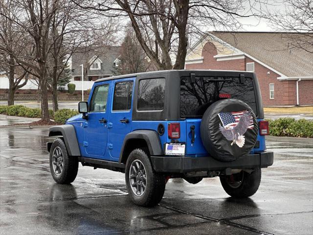 used 2014 Jeep Wrangler Unlimited car, priced at $12,995