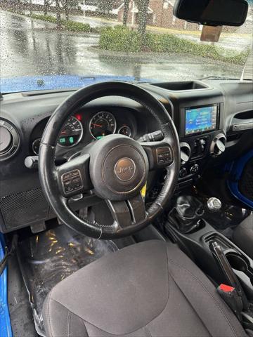 used 2014 Jeep Wrangler Unlimited car, priced at $12,995