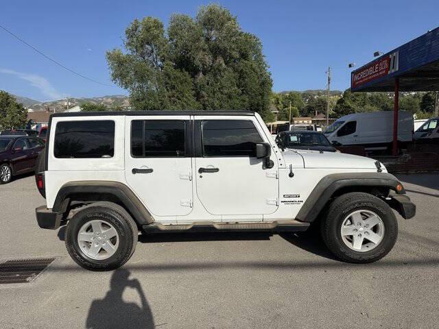 used 2014 Jeep Wrangler Unlimited car, priced at $11,995