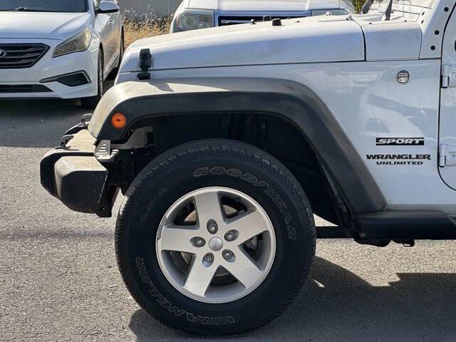 used 2014 Jeep Wrangler Unlimited car, priced at $11,995