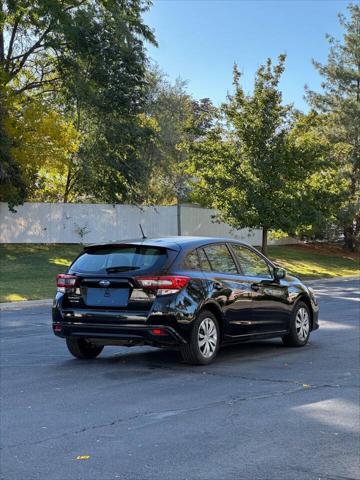 used 2023 Subaru Impreza car, priced at $15,995