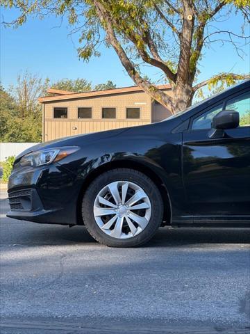 used 2023 Subaru Impreza car, priced at $15,995