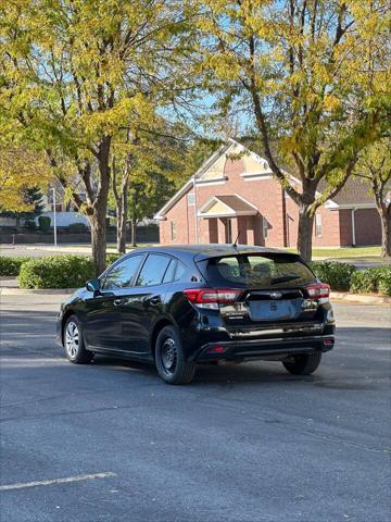 used 2023 Subaru Impreza car, priced at $15,995