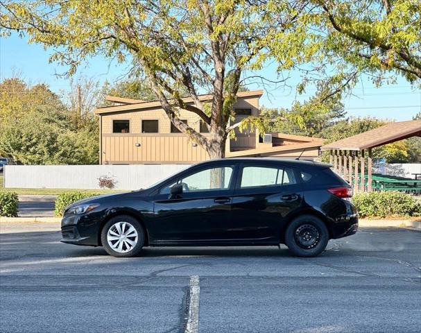 used 2023 Subaru Impreza car, priced at $15,995