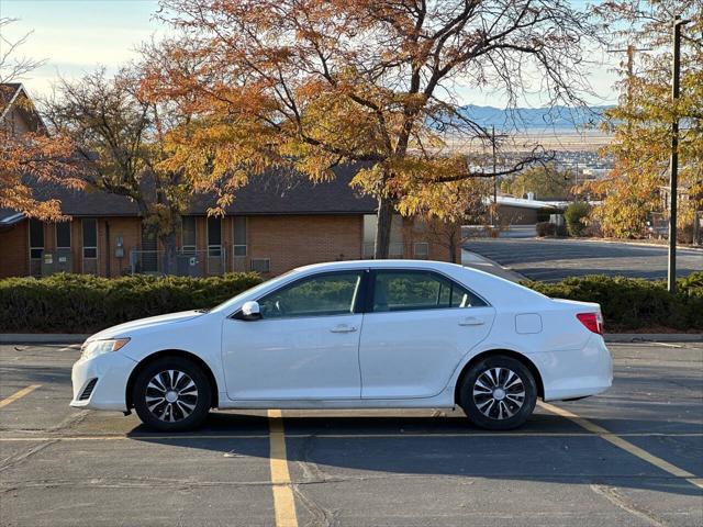 used 2013 Toyota Camry car, priced at $9,995