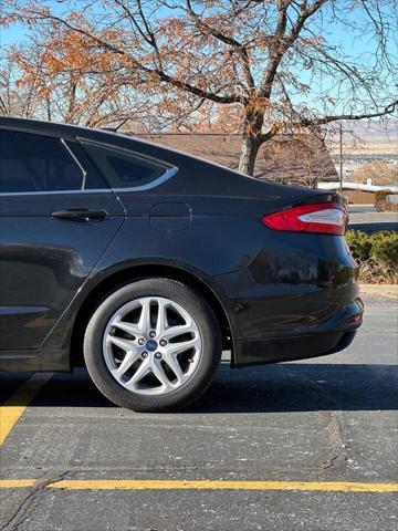 used 2015 Ford Fusion car, priced at $6,995