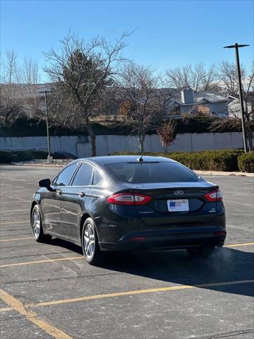 used 2015 Ford Fusion car, priced at $6,995