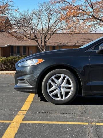 used 2015 Ford Fusion car, priced at $6,995