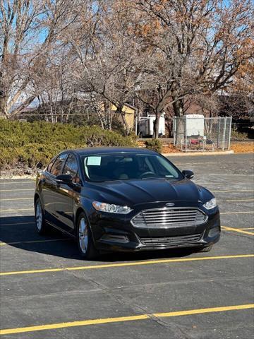 used 2015 Ford Fusion car, priced at $6,995