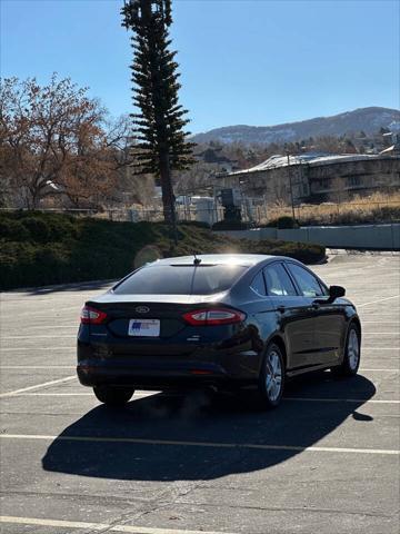 used 2015 Ford Fusion car, priced at $6,995