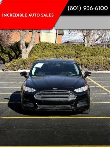 used 2015 Ford Fusion car, priced at $6,995