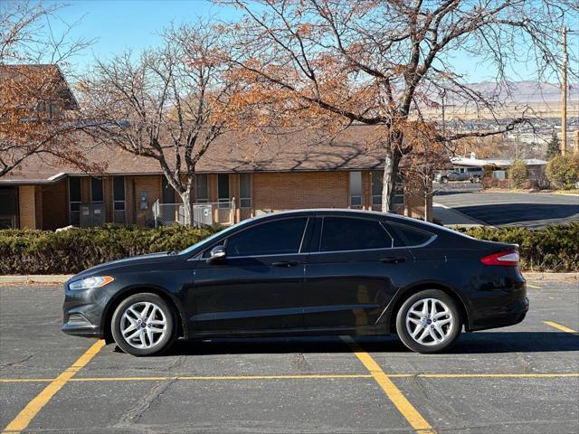 used 2015 Ford Fusion car, priced at $6,995