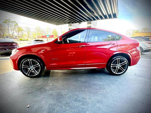 used 2016 BMW X4 car, priced at $19,999