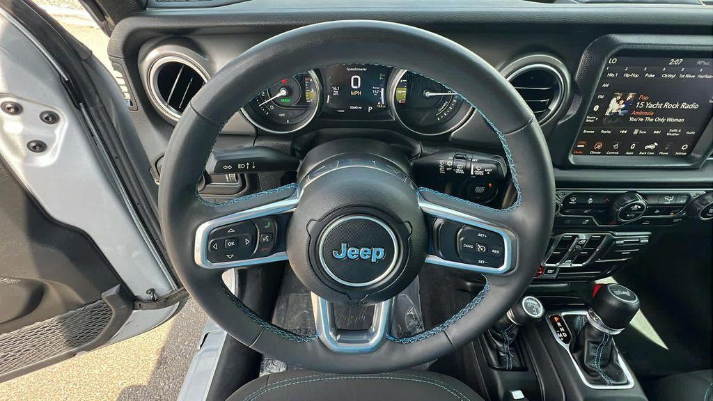used 2023 Jeep Wrangler 4xe car, priced at $31,680