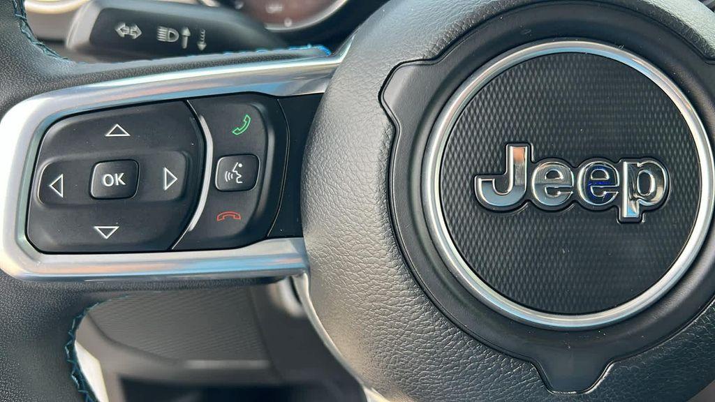 used 2023 Jeep Wrangler 4xe car, priced at $31,680