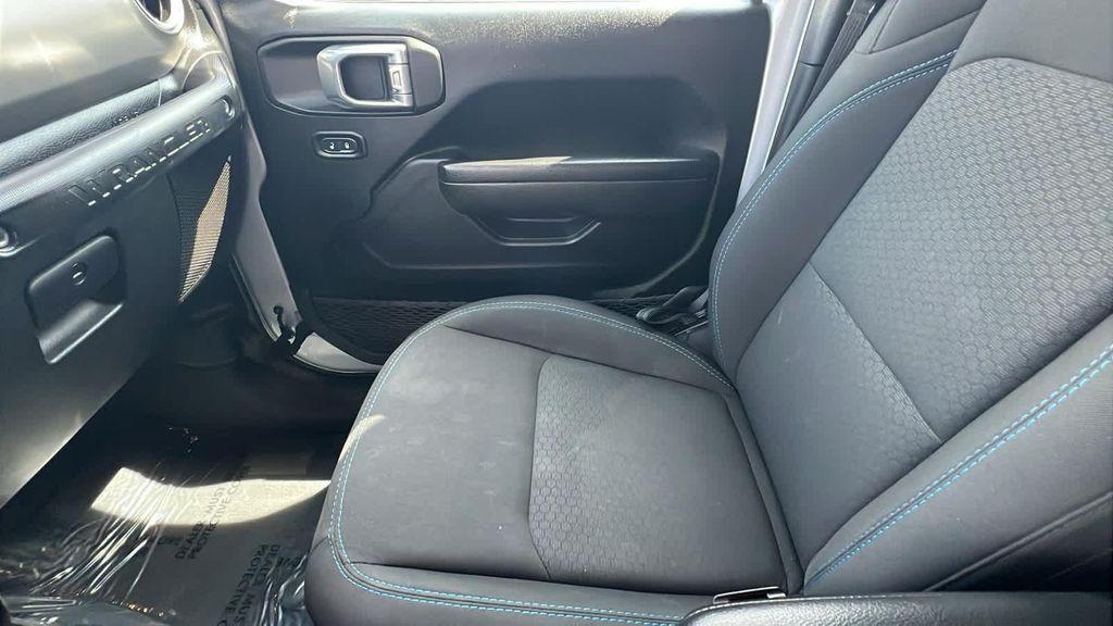 used 2023 Jeep Wrangler 4xe car, priced at $31,680