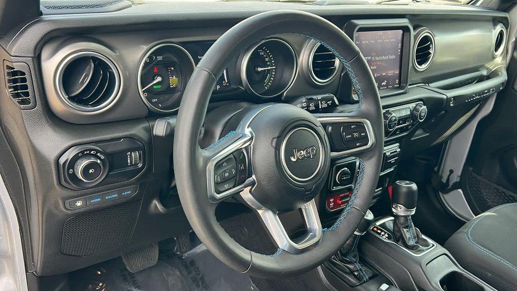 used 2023 Jeep Wrangler 4xe car, priced at $31,680