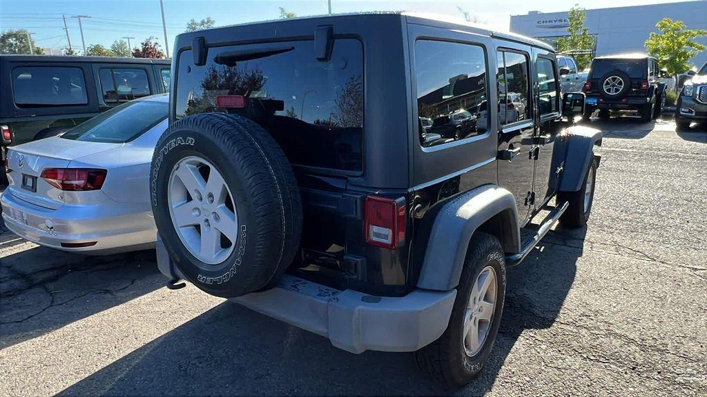 used 2018 Jeep Wrangler JK Unlimited car, priced at $23,980