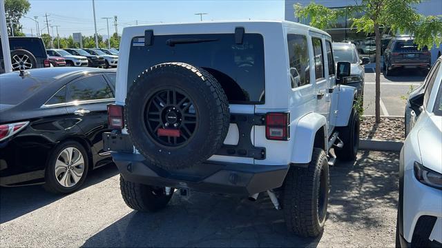 used 2012 Jeep Wrangler Unlimited car, priced at $23,980