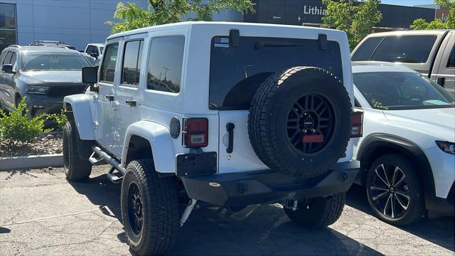 used 2012 Jeep Wrangler Unlimited car, priced at $23,980