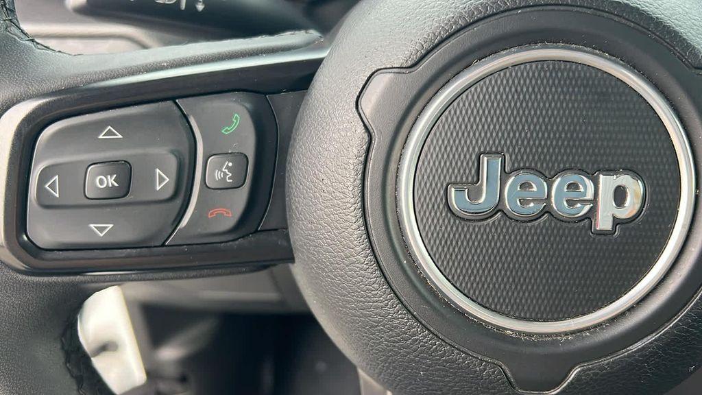 used 2023 Jeep Wrangler car, priced at $28,680