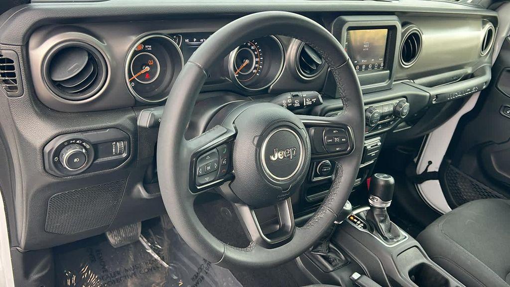 used 2023 Jeep Wrangler car, priced at $28,680