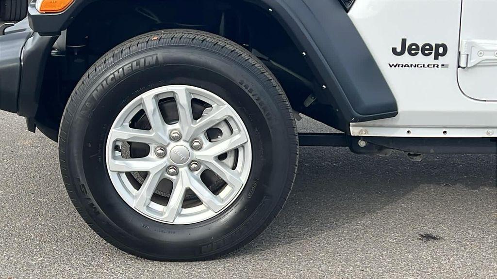 used 2023 Jeep Wrangler car, priced at $28,680