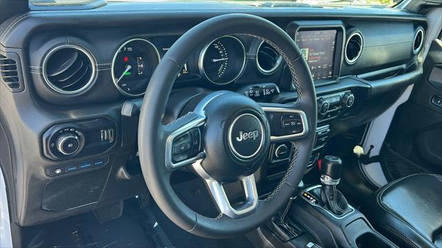 used 2023 Jeep Wrangler 4xe car, priced at $33,980