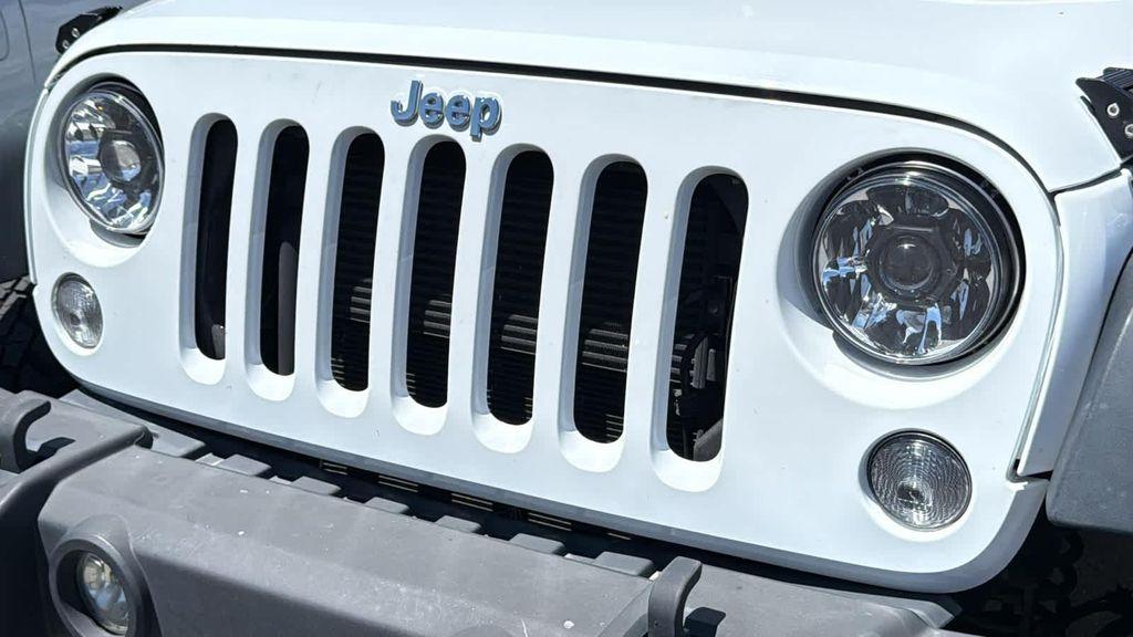 used 2014 Jeep Wrangler Unlimited car, priced at $20,980