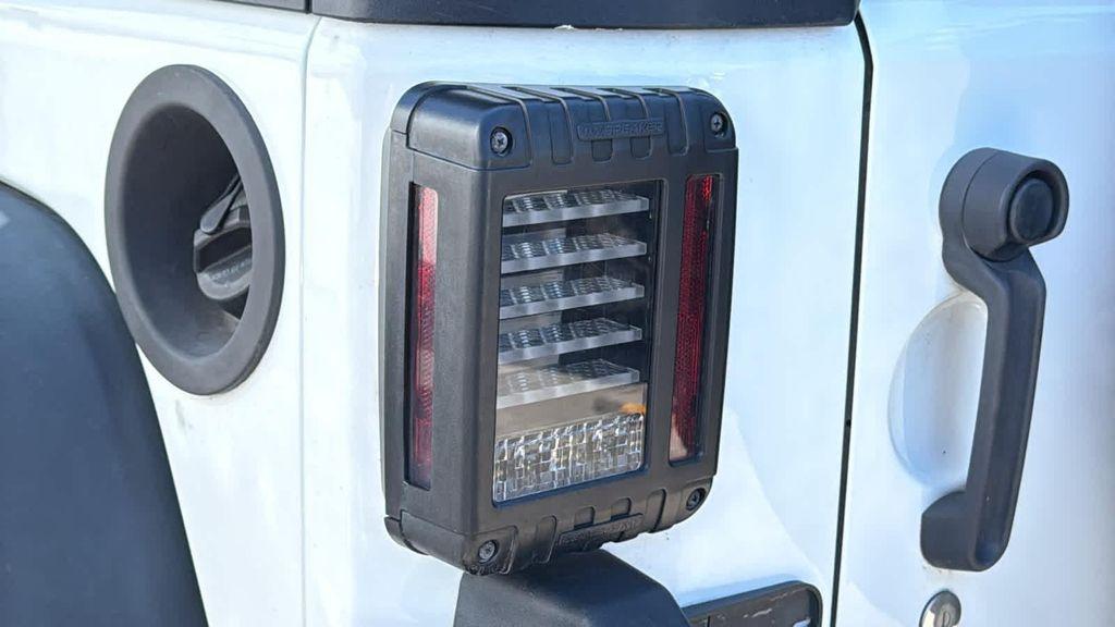 used 2014 Jeep Wrangler Unlimited car, priced at $20,980