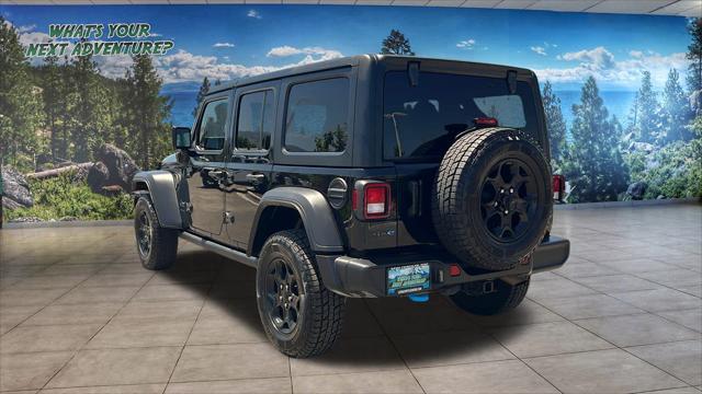 used 2023 Jeep Wrangler 4xe car, priced at $27,980