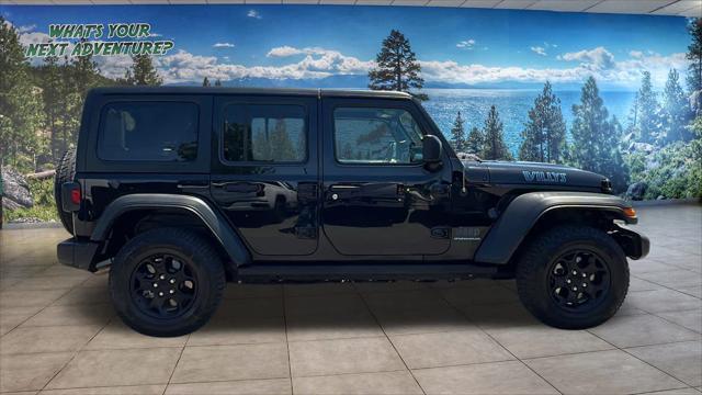 used 2023 Jeep Wrangler 4xe car, priced at $27,980