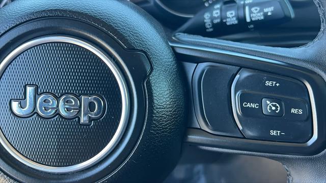 used 2023 Jeep Wrangler 4xe car, priced at $27,980