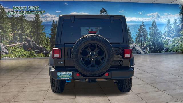 used 2023 Jeep Wrangler 4xe car, priced at $27,980