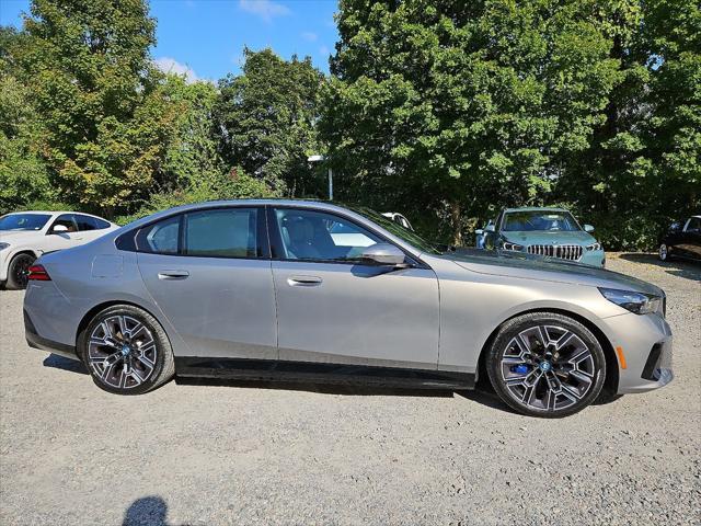 used 2024 BMW i5 car, priced at $65,000