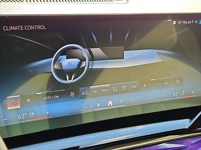 used 2024 BMW i5 car, priced at $59,500