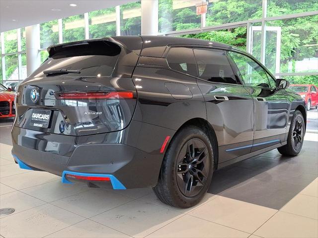 used 2024 BMW iX car, priced at $60,500