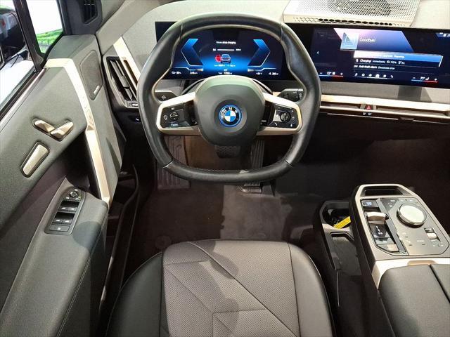 used 2024 BMW iX car, priced at $60,500