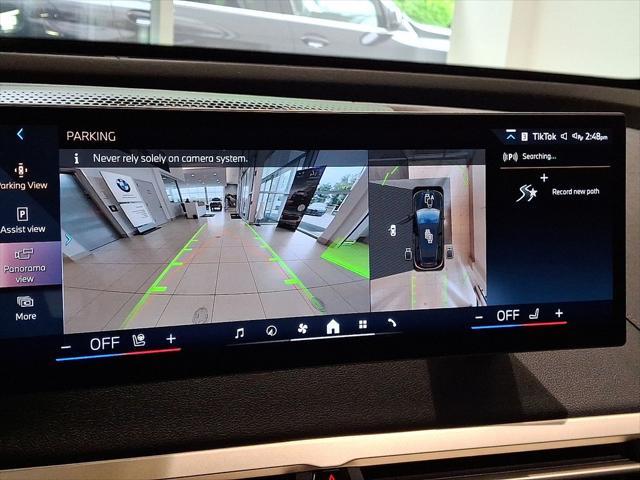 used 2024 BMW iX car, priced at $60,500